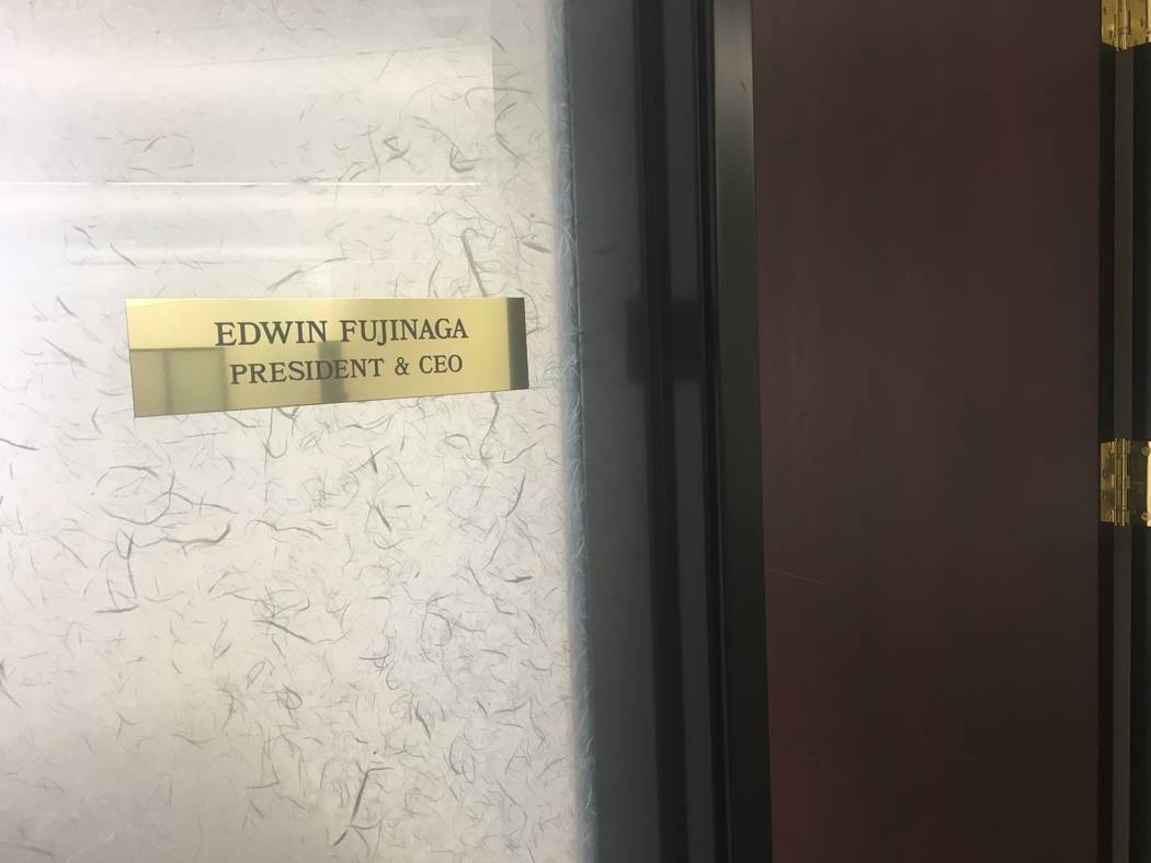 A nameplate for former MRI International owner Edwin Fujinaga is still inside the company's former offices in Las Vegas on Friday, April 13, 2018. Fujinaga was accused of running a massive Ponzi s ...