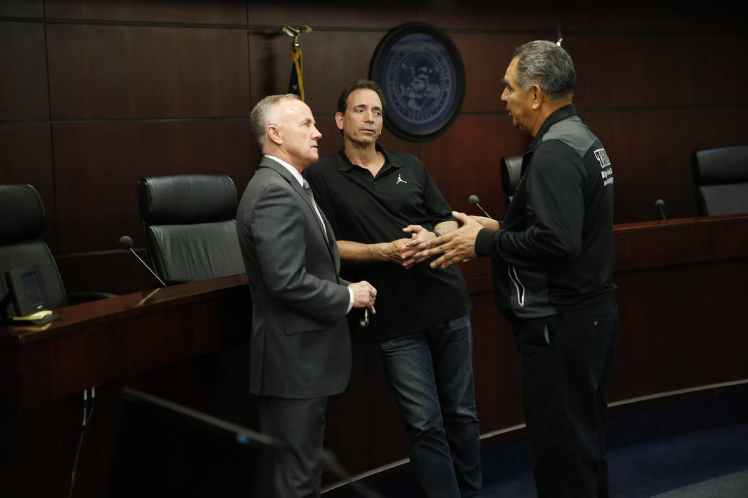 Bob Bennett, from left, executive director of the Nevada Athletic Commission, with boxing promoter Tom Loeffler and trainer Abel Sanchez, during a Nevada Athletic Commission meeting at the Grant S ...
