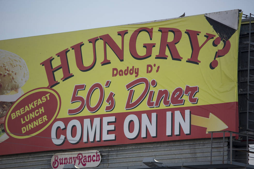 A billboard for Daddy D's 50's Diner in the parking lot of the Area 51 Alien Center in Amargosa Valley, Nevada, about 90 miles north of Las Vegas, Friday, April 6, 2018. Richard Brian Las Vegas Re ...