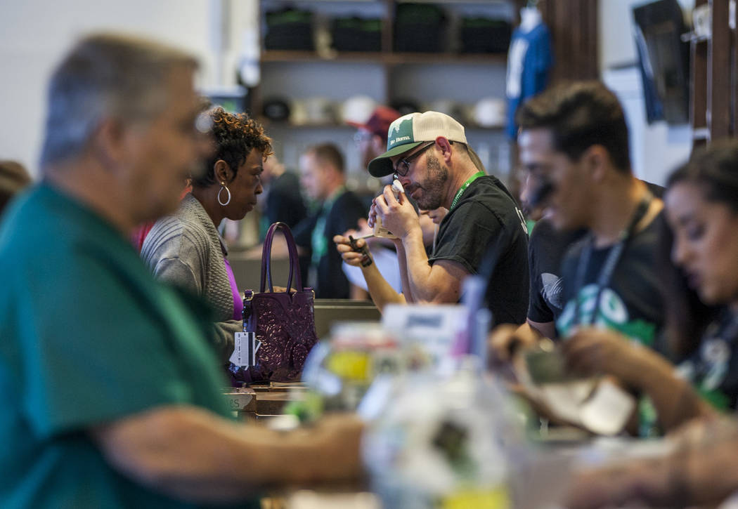 Customers check out cannabis products at Nuwu Cannabis Marketplace on Friday, April 23, 2018. Patrick Connolly Las Vegas Review-Journal @PConnPie