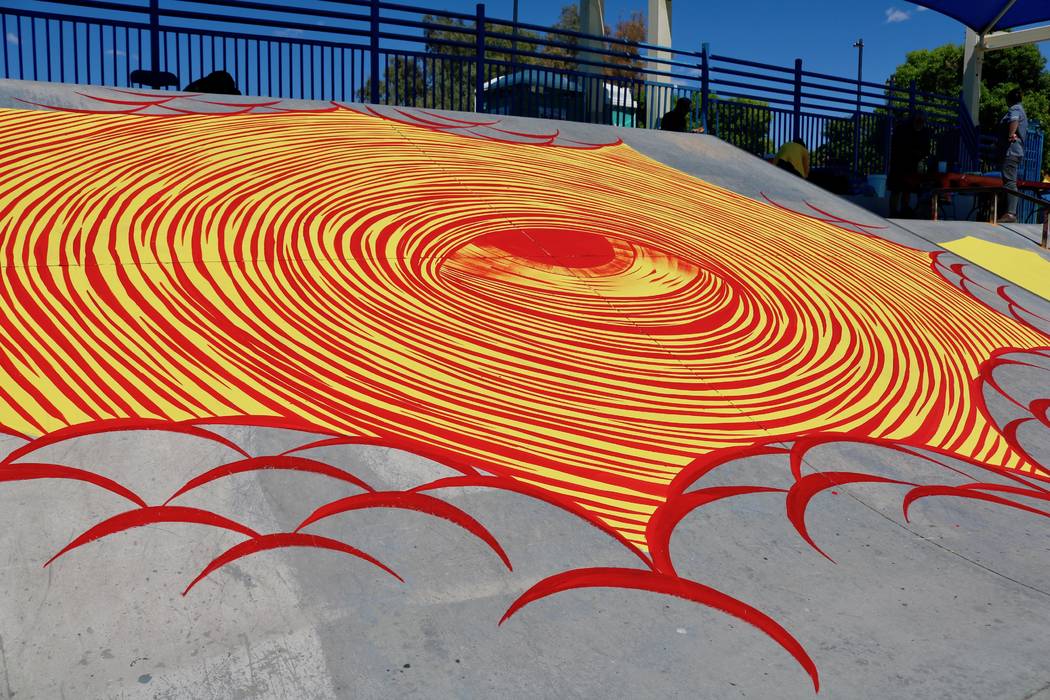 Los Angeles-based artist Andrew Schoultz joined volunteer artists at the skatepark at Winchester Cultural Center Tuesday, April 17, 2018 to paint the park in advance of his solo installation at th ...
