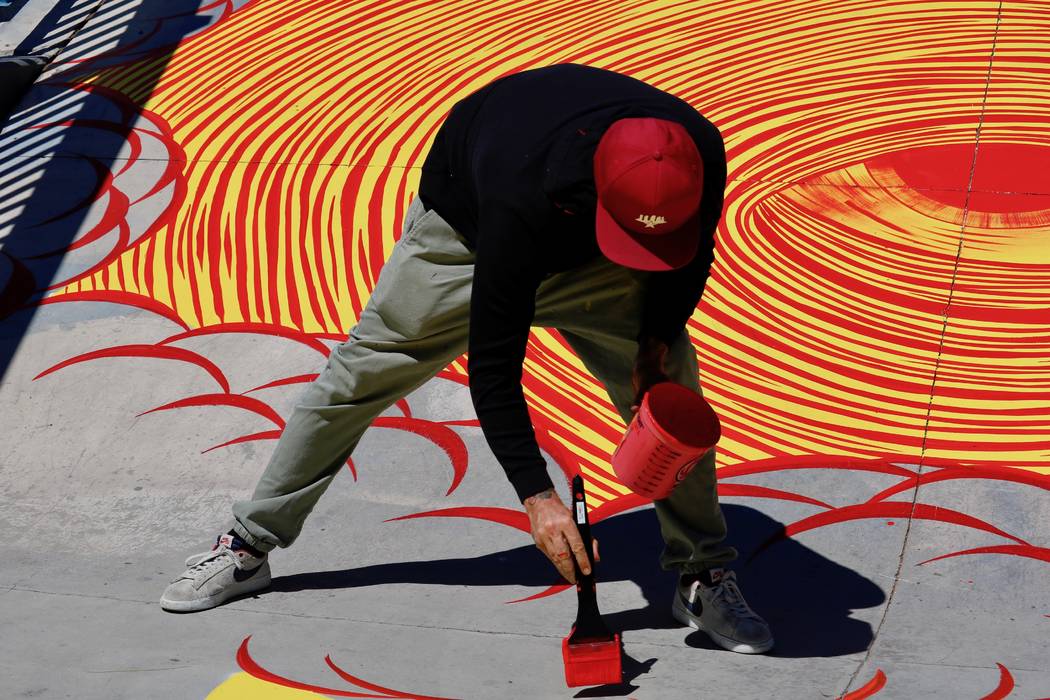 Los Angeles-based artist Andrew Schoultz joined volunteer artists at the skatepark at Winchester Cultural Center Tuesday, April 17, 2018 to paint the park in advance of his solo installation at th ...