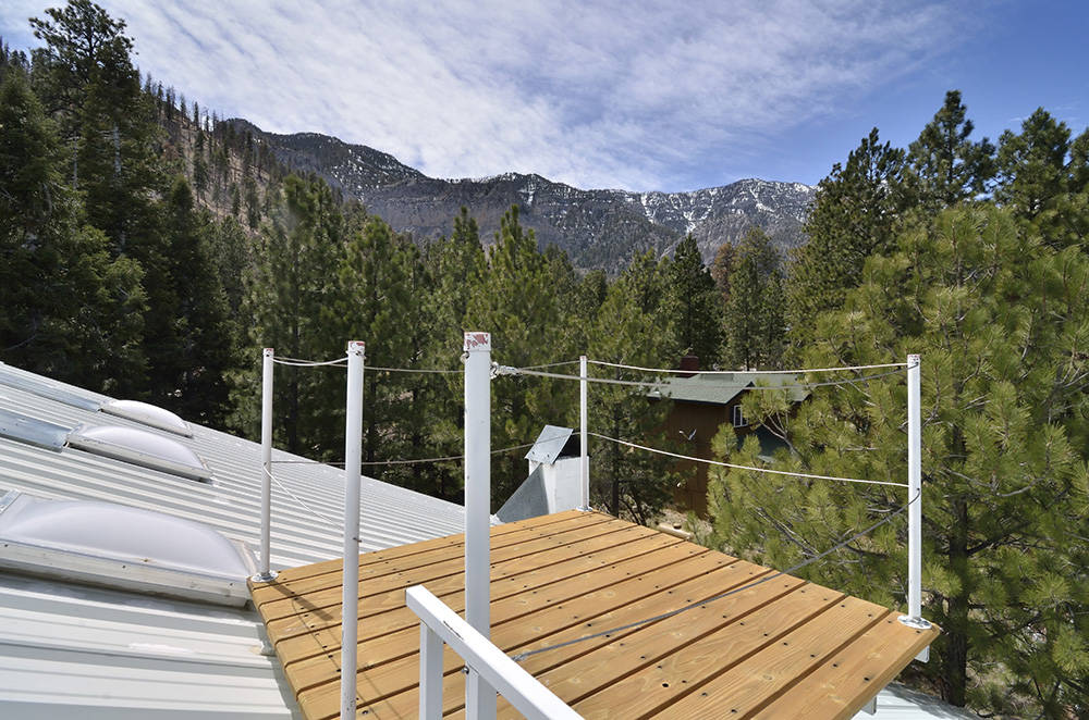 An observation deck is shown on the roof of a home of the Mount Charleston home. (Bill Hughes Real Estate Millions)