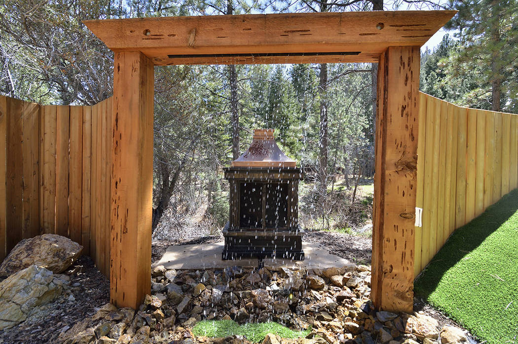 A water feature at the front of the home. (Bill Hughes Real Estate Millions)