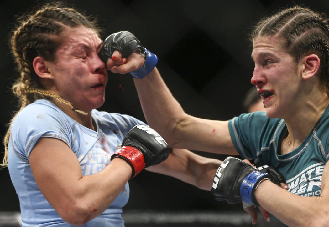 Nicco Montano, left, fights Roxanne Modafferi during a women’s flyweight title bout at the Park Theater at Monte Carlo in Las Vegas on Friday, Dec. 1, 2017. Montano won via unanimous decis ...