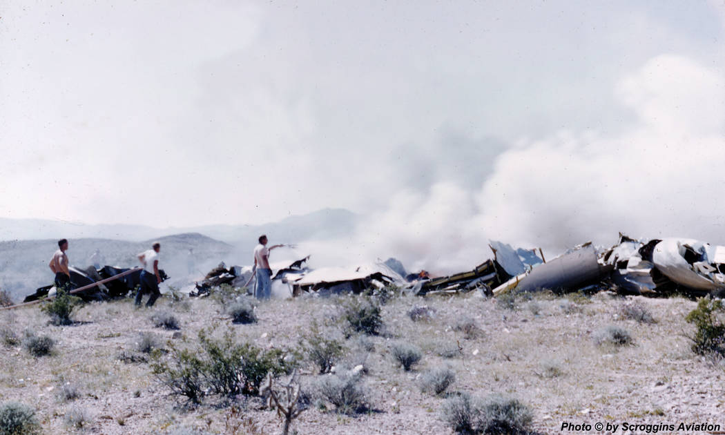 The wreckage of a United Airlines DC-7 smolders in the desert southwest of Las Vegas after a midair collision and crash that killed 49 people on April 21, 1958. Provided by Doug Scroggins