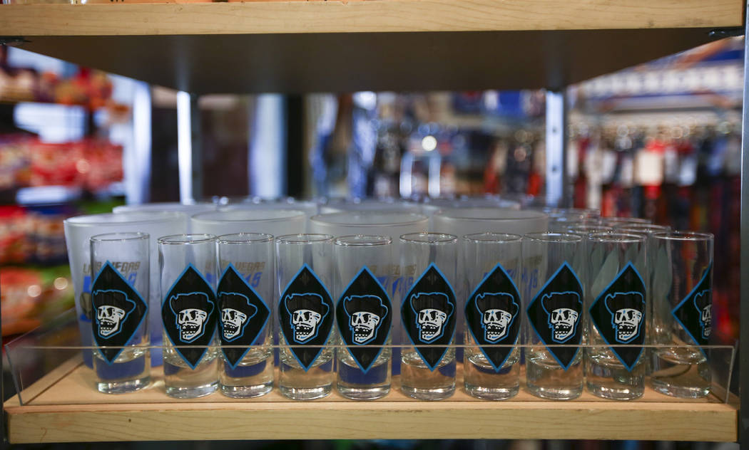 Shot glasses featuring the special Las Vegas 51s "Reyes de Plata" (Silver Kings) name, part of a new Minor League Baseball initiative, are displayed at the team store at Cashman Field in ...