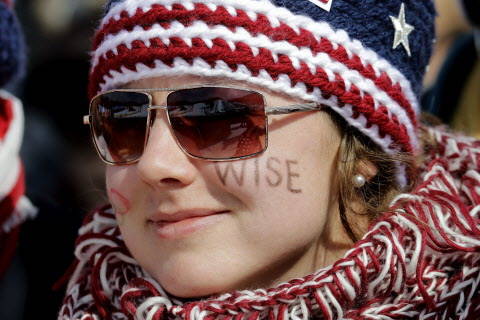A fan of David Wise, of the United States, watches during the men's halfpipe final at Phoenix Snow Park at the 2018 Winter Olympics in Pyeongchang, South Korea, Thursday, Feb. 22, 2018. (AP P ...