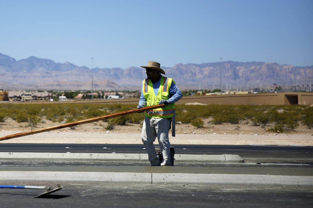 An employee works on a road-widening project near an undeveloped stretch on Las Vegas Boulevard in Las Vegas on Friday, April 27, 2018. Andrea Cornejo Las Vegas Review-Journal @dreacornejo