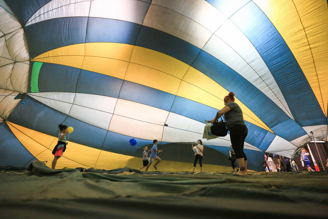 Kids play in a half-inflated hot air balloon at the Las Vegas Science and Technology Festival at the Cashman Center in Las Vegas on Saturday, May 6, 2017. (Brett Le Blanc/Las Vegas Review-Journal ...