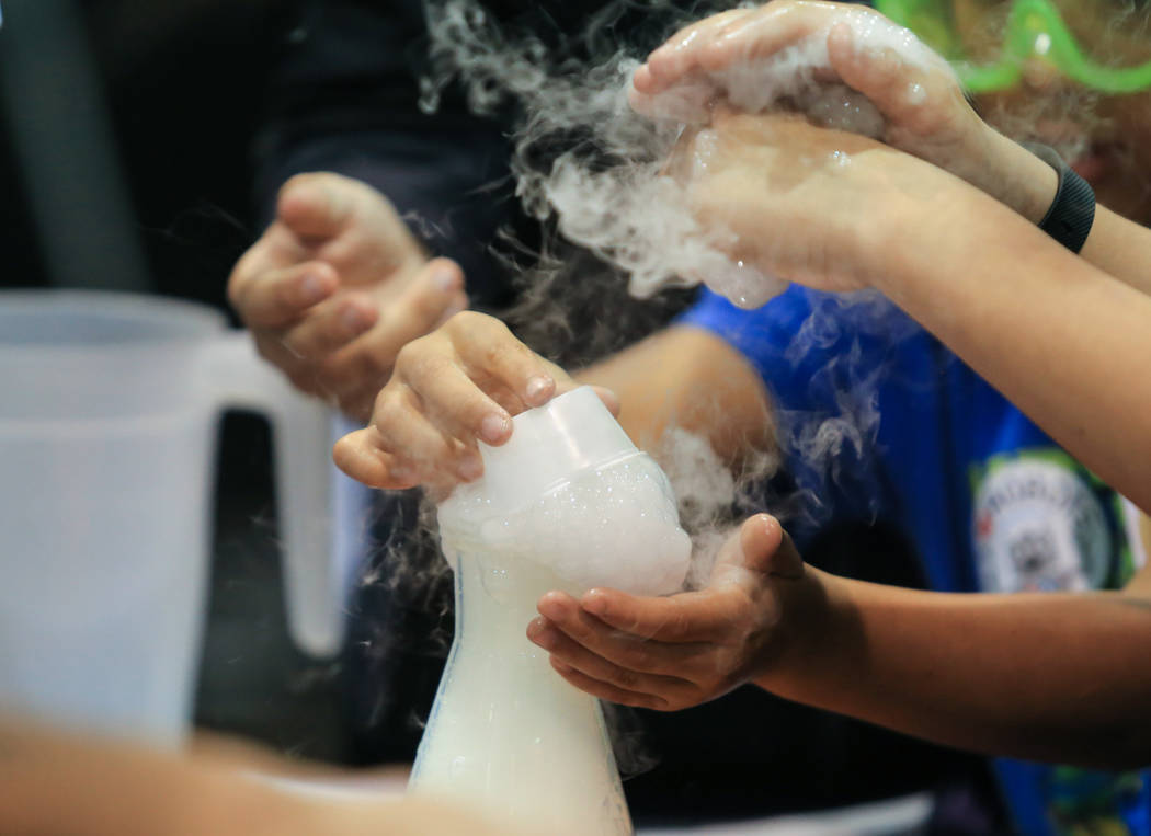 Kids participate in a hands-on demonstration Las Vegas Science and Technology Festival at the Cashman Center in Las Vegas on Saturday, May 6, 2017. (Brett Le Blanc/Las Vegas Review-Journal file ph ...