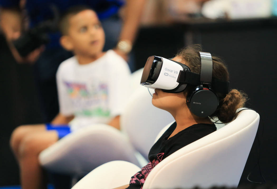Kesia Hyman, 7, experiences a virtual reality simulation at the Las Vegas Science and Technology Festival at the Cashman Center in Las Vegas on Saturday, May 6, 2017.(Brett Le Blanc/Las Vegas Revi ...