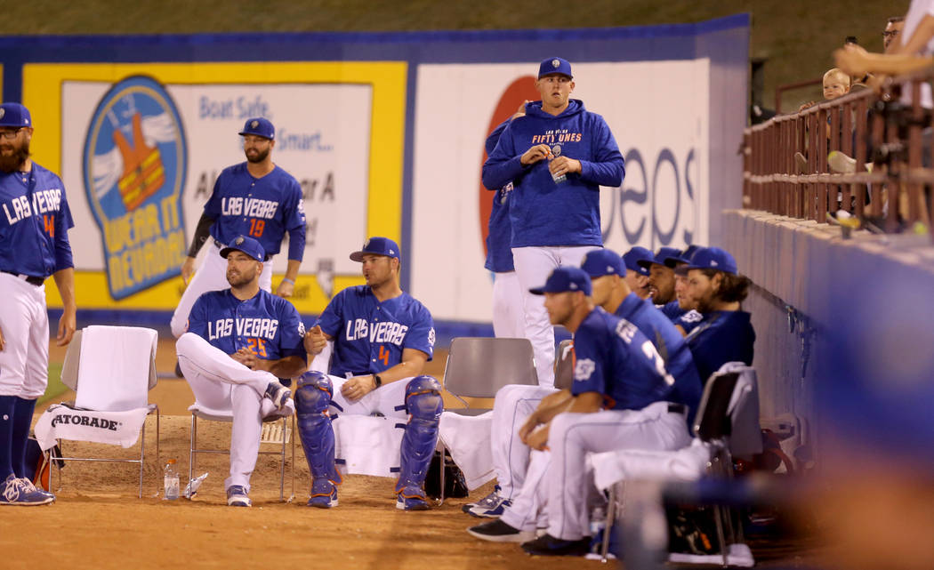 Las Vegas 51s pitcher Chris Flexen, top right, prepares to pitch in the bullpen during a baseball game against the El Paso Chihuahuas at Cashman Field in Las Vegas Monday, April 23, 2018. K.M. Can ...