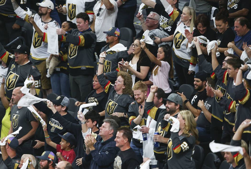 Golden Knights fans celebrate a goal by center Cody Eakin, not pictured, during the first period of Game 1 of an NHL hockey second-round playoff series against the San Jose Sharks at T-Mobile Aren ...