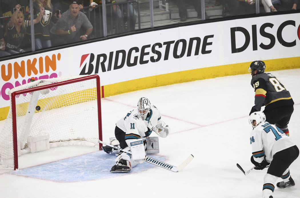 Golden Knights right wing Alex Tuch (89) scores a goal past San Jose Sharks goaltender Martin Jones (31) during the first period of Game 1 of an NHL hockey second-round playoff series at T-Mobile ...
