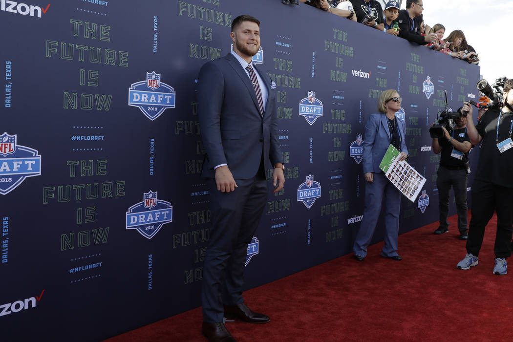 UCLA's Kolton Miller poses for photos on the red carpet before the first round of the NFL football draft, Thursday, April 26, 2018, in Arlington, Texas. (AP Photo/Eric Gay)