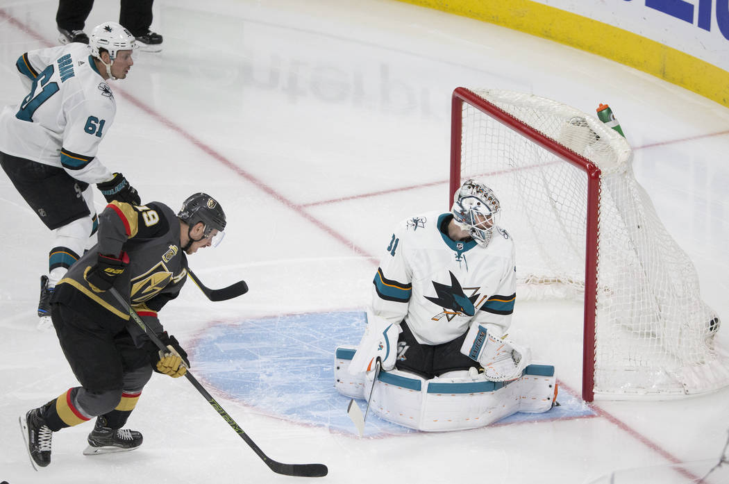Golden Knights right wing Reilly Smith (19) celebrates after Vegas scored a second period goal against San Jose Sharks goaltender Martin Jones (31) during game two of their second round playoff se ...