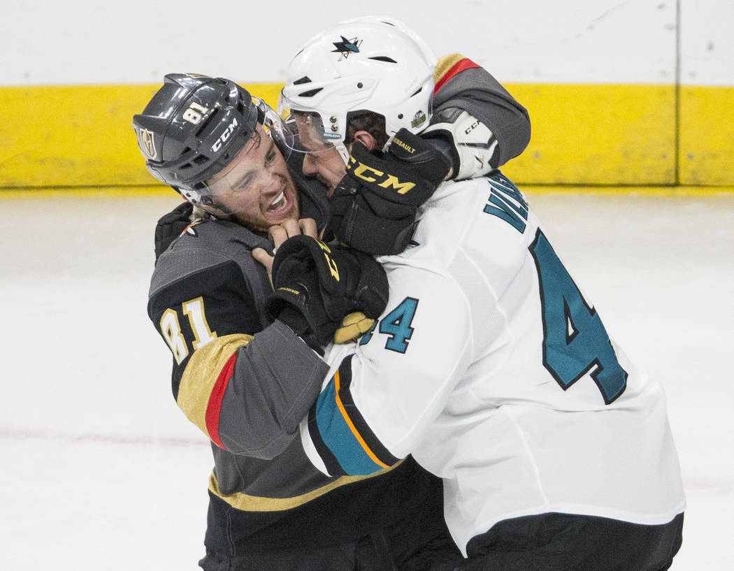Golden Knights center Jonathan Marchessault (81) gets tied up with San Jose Sharks defenseman Marc-Edouard Vlasic (44) during game two of their second round playoff series on Saturday, April 28, 2 ...