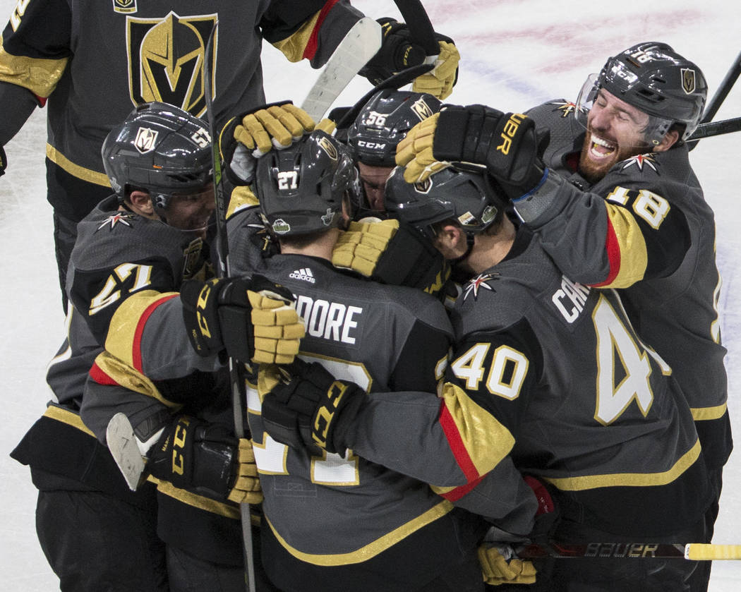 Golden Knights left wing James Neal (18) celebrates with teammates after center Jonathan Marchessault (81) scored an overtime goal that was later called off during game two of their second round p ...