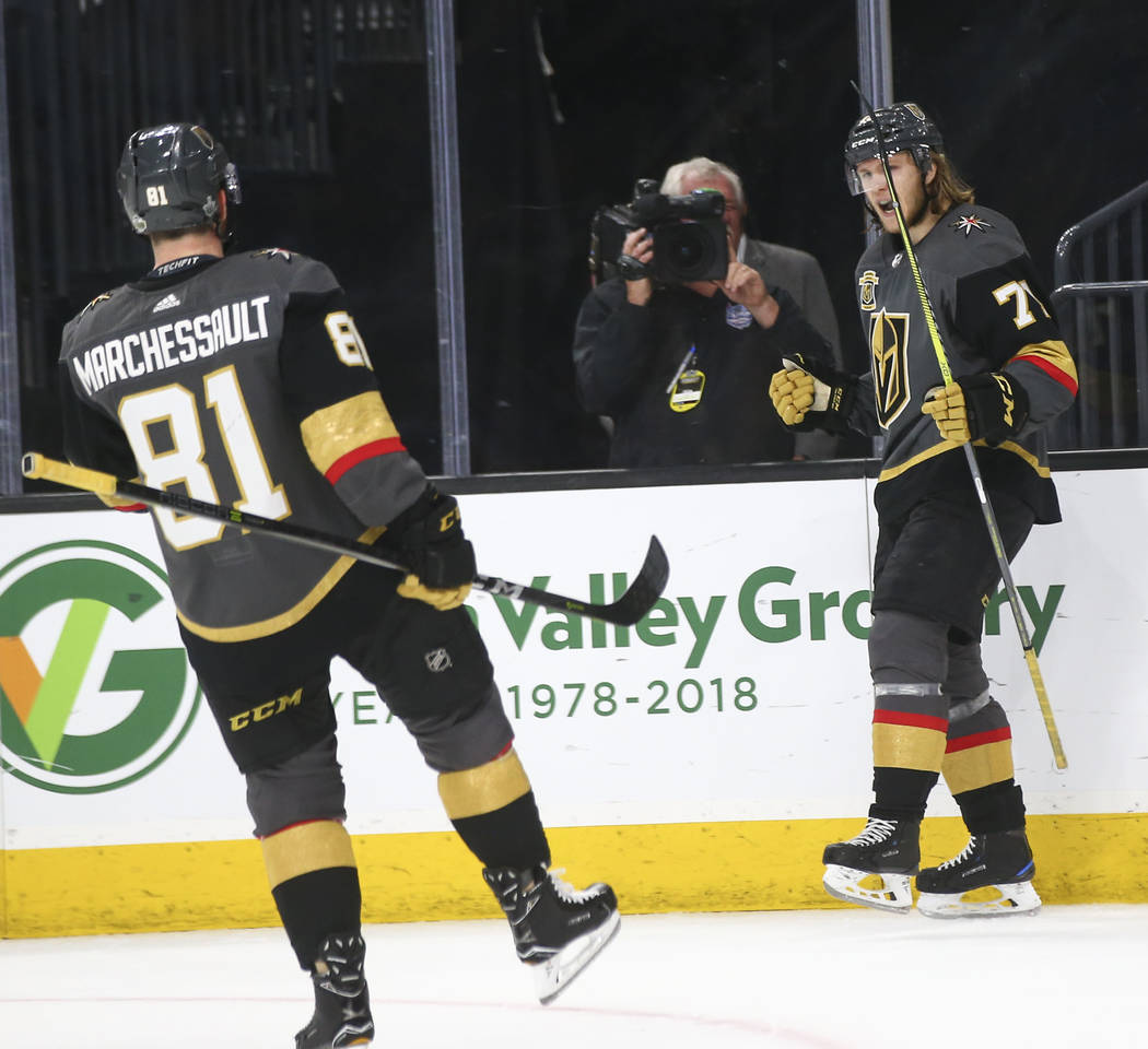 Golden Knights center William Karlsson (71) celebrates his goal with center Jonathan Marchessault (81) during the first period of Game 2 of an NHL hockey second-round playoff series against the Sa ...