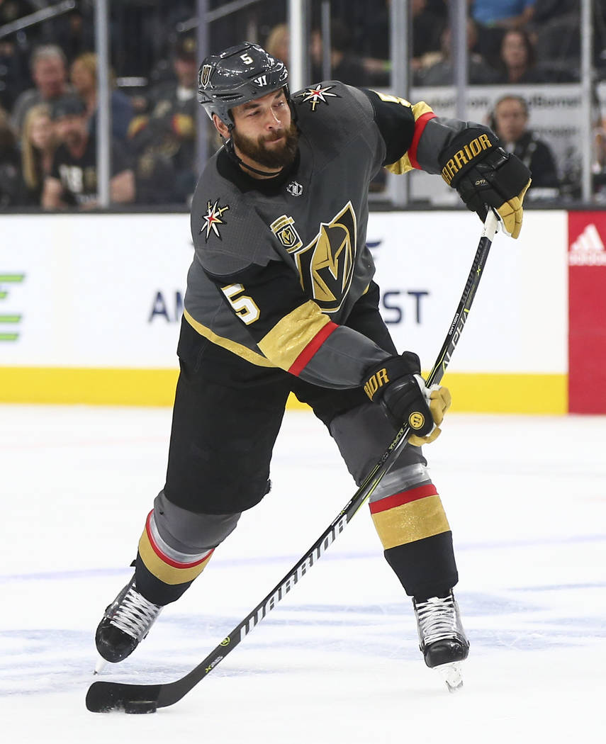 Golden Knights defenseman Deryk Engelland (5) shoots against the San Jose Sharks during the first period of Game 2 of an NHL hockey second-round playoff series at T-Mobile Arena in Las Vegas on Sa ...