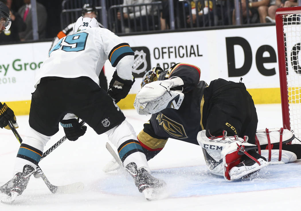 San Jose Sharks center Logan Couture (39) attempts to get the puck past Golden Knights goaltender Marc-Andre Fleury (29) during the second period of Game 2 of an NHL hockey second-round playoff se ...