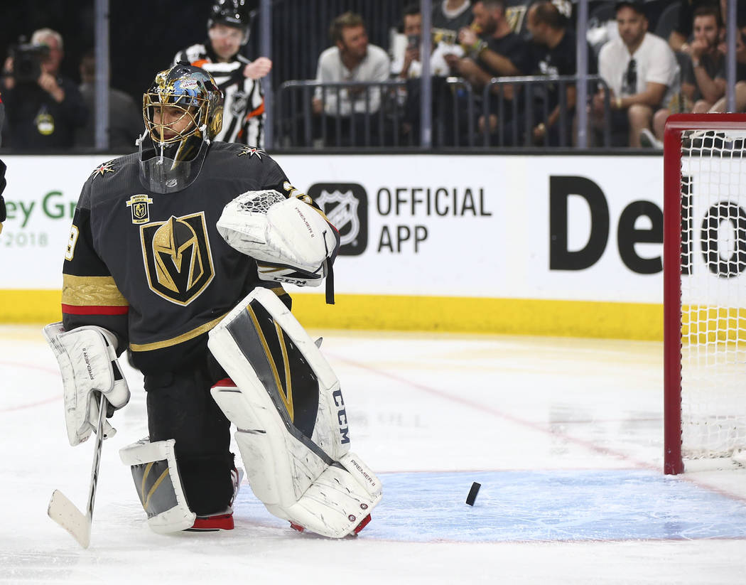 Golden Knights goaltender Marc-Andre Fleury (29) gets scored on by the San Jose Sharks during the second period of Game 2 of an NHL hockey second-round playoff series at T-Mobile Arena in Las Vega ...