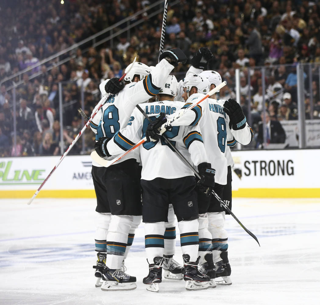 San Jose Sharks players celebrate after their first goal against the Golden Knights during the second period of Game 2 of an NHL hockey second-round playoff series at T-Mobile Arena in Las Vegas o ...