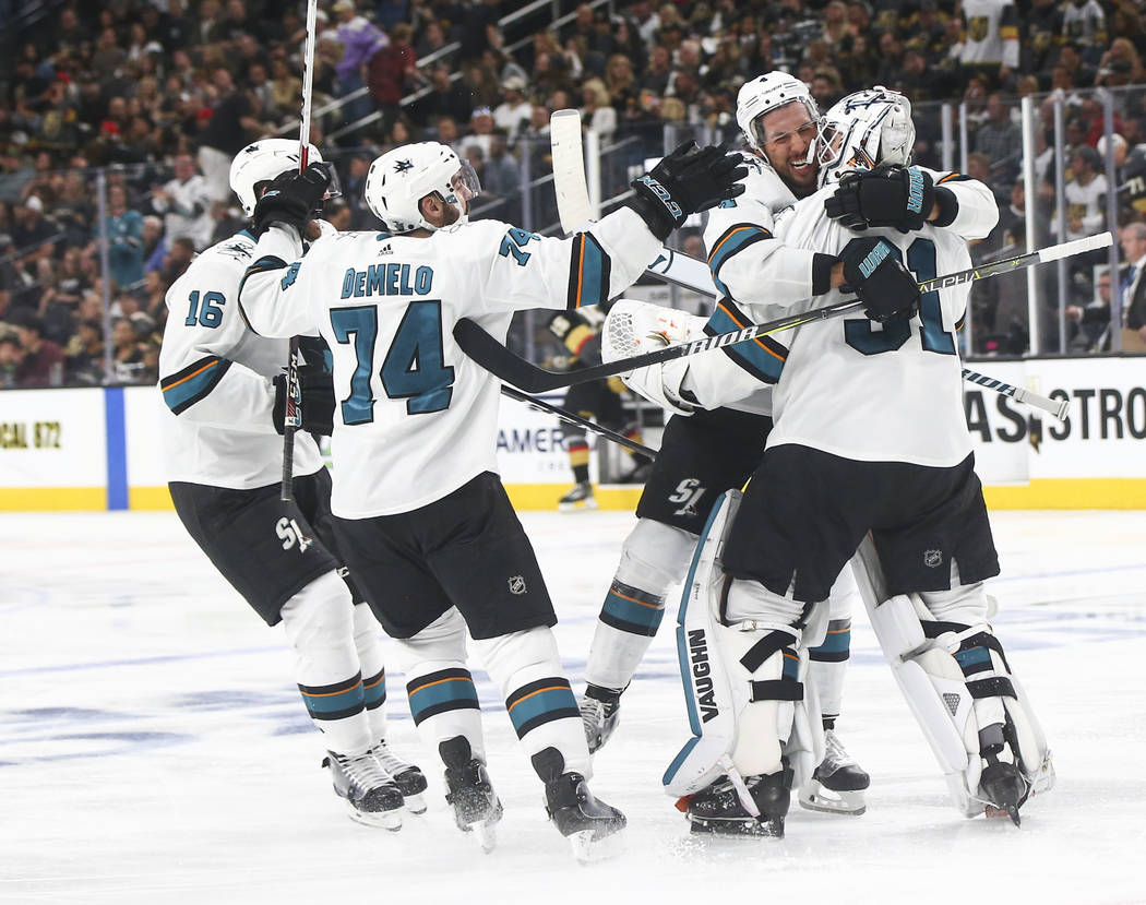 San Jose Sharks players celebrate their double overtime defeat over the Golden Knights in Game 2 of an NHL hockey second-round playoff series at T-Mobile Arena in Las Vegas on Saturday, April 28, ...