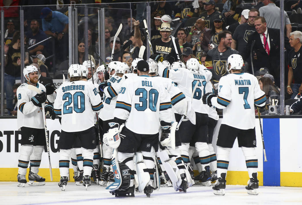 San Jose Sharks players celebrate their double overtime defeat over the Golden Knights in Game 2 of an NHL hockey second-round playoff series at T-Mobile Arena in Las Vegas on Saturday, April 28, ...