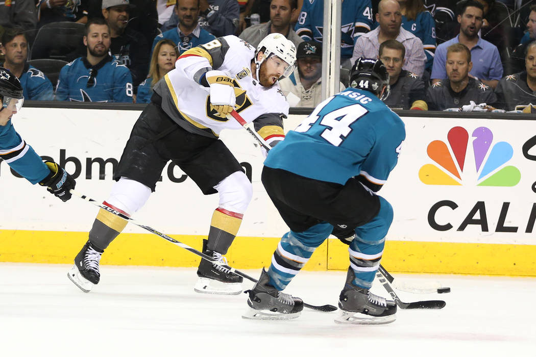 Vegas Golden Knights left wing James Neal (18) takes a shot under pressure from San Jose Sharks defenseman Marc-Edouard Vlasic (44) during the first period in Game 3 of an NHL hockey second-round ...