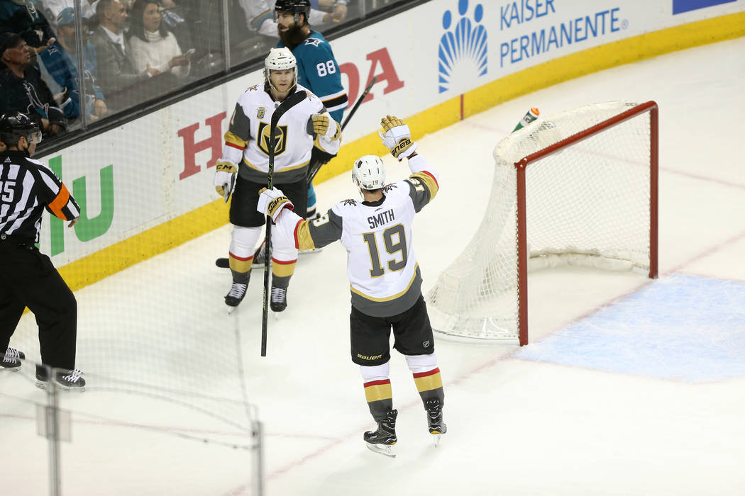Vegas Golden Knights right wing Reilly Smith (19) celebrates after a score against the San Jose Sharks with the assist of Vegas Golden Knights center William Karlsson (71) during the second period ...