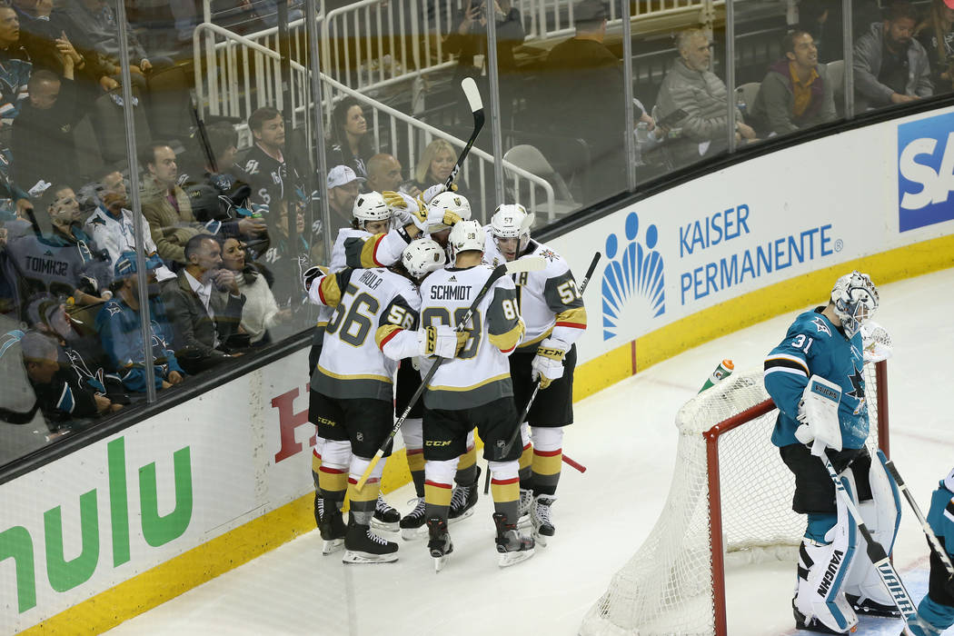 Vegas Golden Knights celebrates a goal by defenseman Colin Miller (6) against the San Jose Sharks during the second period in Game 3 of an NHL hockey second-round playoff series at the SAP Center ...