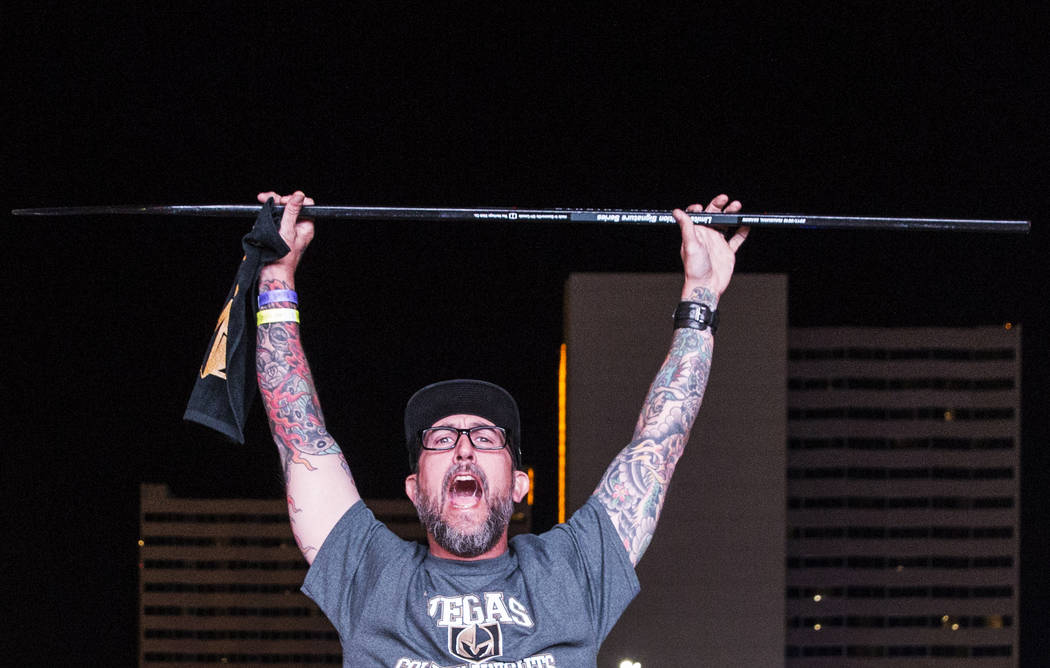 Golden Knights fan Jameson Jackson celebrates at a watch party after Vegas' Jonathan Marchessault scored an overtime goal to beat the San Jose Sharks 4-3 during game three of Vegas' playoff series ...