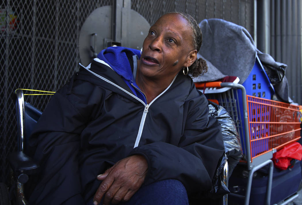 In this photo taken on Thursday, April 26, 2018, Lawana Tillman sits in a wheelchair with her belongings in San Francisco. Tillman camps out in a wheelchair with friends on a corner they’ve ...