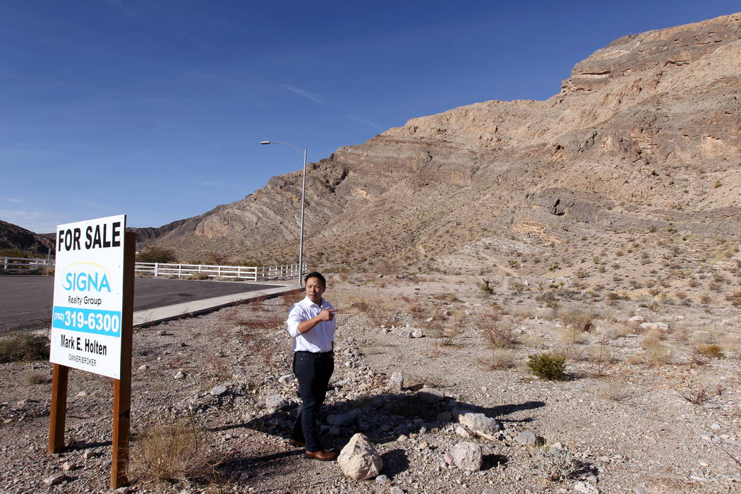 Real estate investor Andy Pham at his northwest Las Vegas property Jan. 29, 2018. Pham and his investors lost control of the multi-million dollar property to fraudsters who filed fake documents wi ...