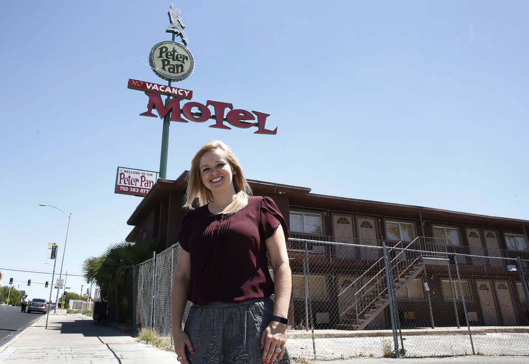Shae Cox, deputy director of Preserve Nevada, poses for photo outside the boarded up Peter Pan Motel at 110 N. 13th St., on Wednesday, May 16, 2018, in Las Vegas. Bizuayehu Tesfaye/Las Vegas Revie ...