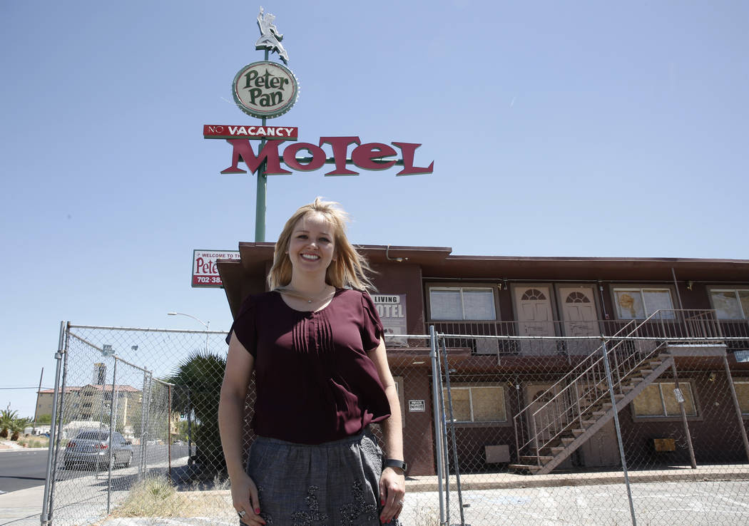 Shae Cox, deputy director of Preserve Nevada, poses for photo outside the boarded up Peter Pan Motel at 110 N. 13th St., on Wednesday, May 16, 2018, in Las Vegas. Bizuayehu Tesfaye/Las Vegas Revie ...