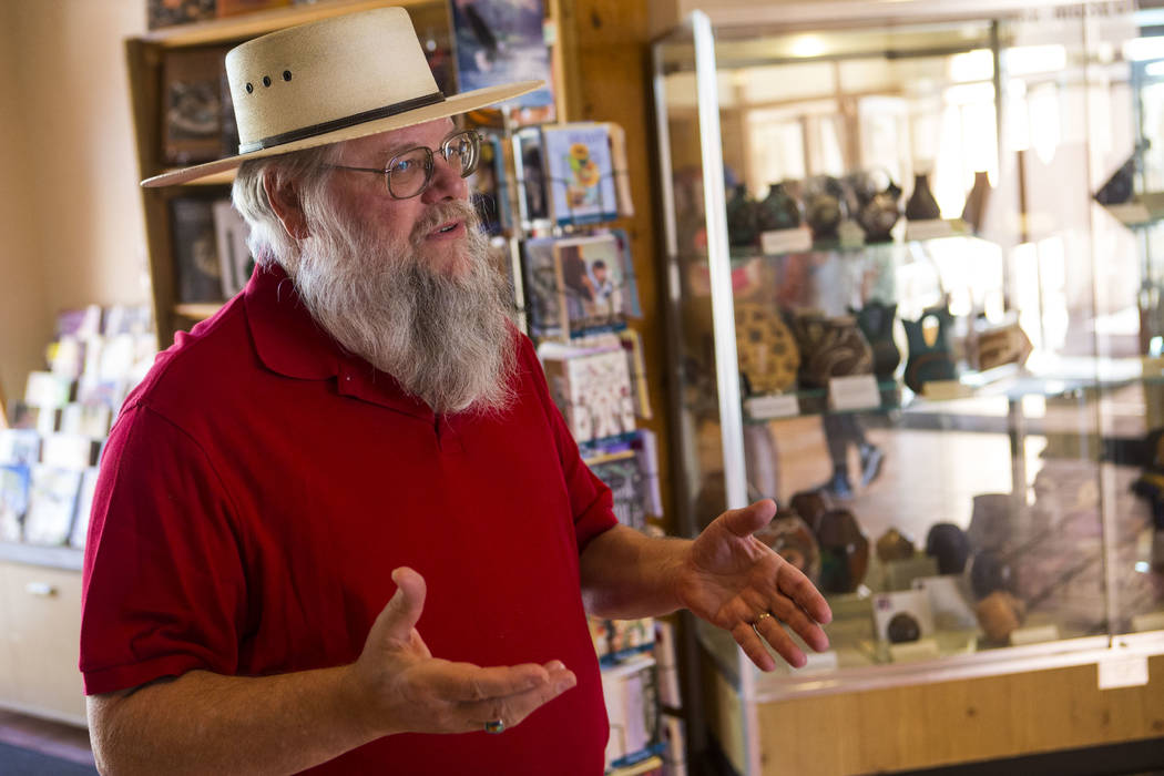 Clark County museums administrator Mark Hall-Patton talks about the history of the Clark County Museum in Henderson on Wednesday, April 4, 2018. The museum is featuring an exhibition called "50 Ye ...