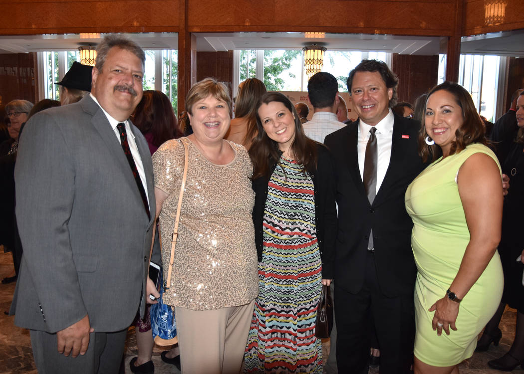 Jason Wright (far left) and his wife, CCSD Board president Deanna Wright (second from left) at a function with Superintendent Pat Skorkowsky (second from right). (Flickr)