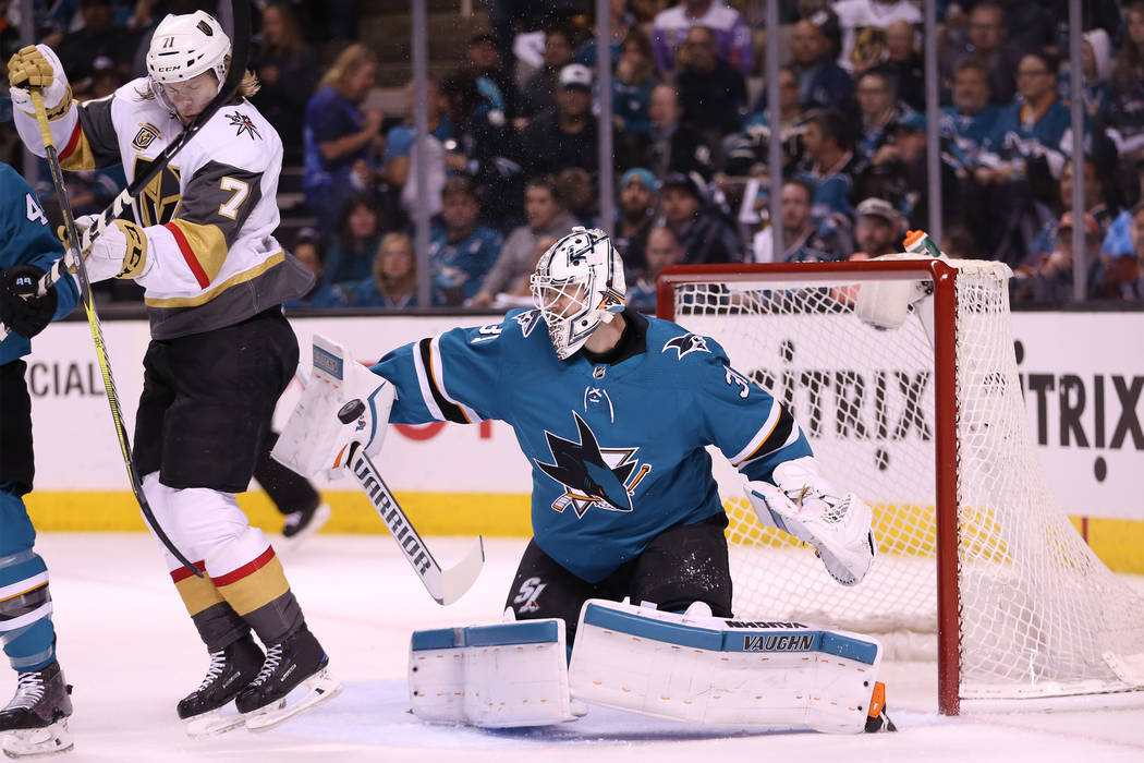 Vegas Golden Knights center William Karlsson (71) moves out of the way of a shot before San Jose Sharks goaltender Martin Jones (31) made the stop during the first period in Game 4 of an NHL hocke ...