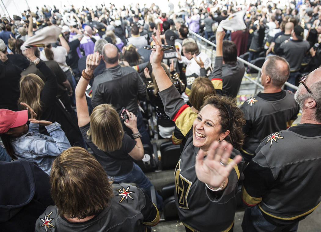 Fans celebrate after Vegas' Erik Haula scored a game tying goal in the third period during game two of their second round playoff series on Saturday, April 28, 2018, at T-Mobile Arena, in Las Vega ...