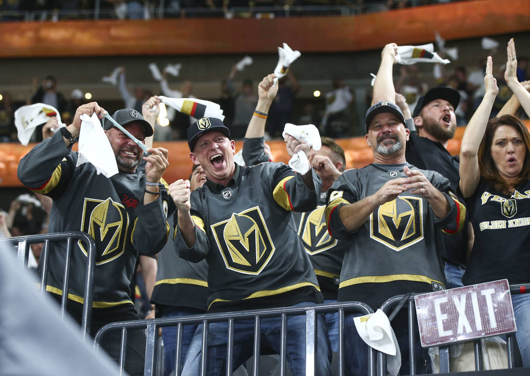 Golden Knights fans celebrate a goal by Golden Knights center William Karlsson, not pictured, during the first period of Game 2 of an NHL hockey second-round playoff series against the San Jose Sh ...