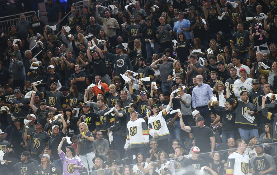Golden Knights fans react during the first overtime period of Game 2 of an NHL hockey second-round playoff series against the San Jose Sharks at T-Mobile Arena in Las Vegas on Saturday, April 28, ...