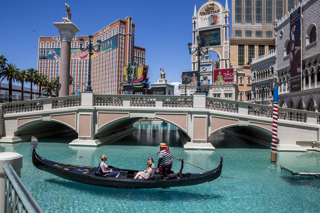 Golden Knights national anthem singer Carnell Johnson, also known as "Golden Pipes," takes Scottish visitors Alexandra Orr, Michelle Brooks and Natasha Anderson for a gondola ride outsid ...
