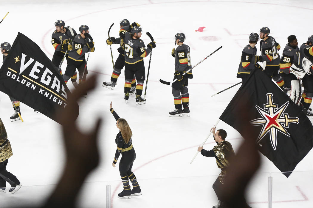Golden Knights players celebrate after defeating the San Jose Sharks in an NHL hockey game at T-Mobile Arena in Las Vegas on Saturday, March 31, 2018. Chase Stevens Las Vegas Review-Journal @csste ...