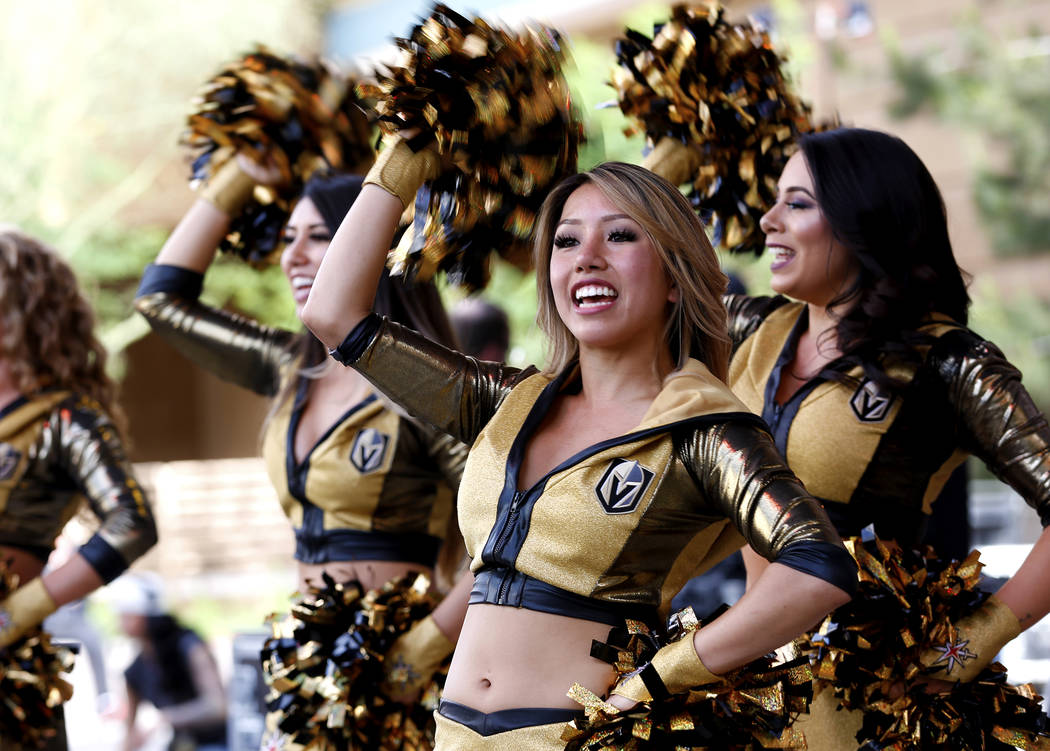 Vegas Golden Knights cheerleaders rile up the crowd during attend a VGK watch party for game six of the Stanley Cup playoffs outside on Toshiba Plaza in Las Vegas on Sunday, May 6, 2018. Andrea Co ...