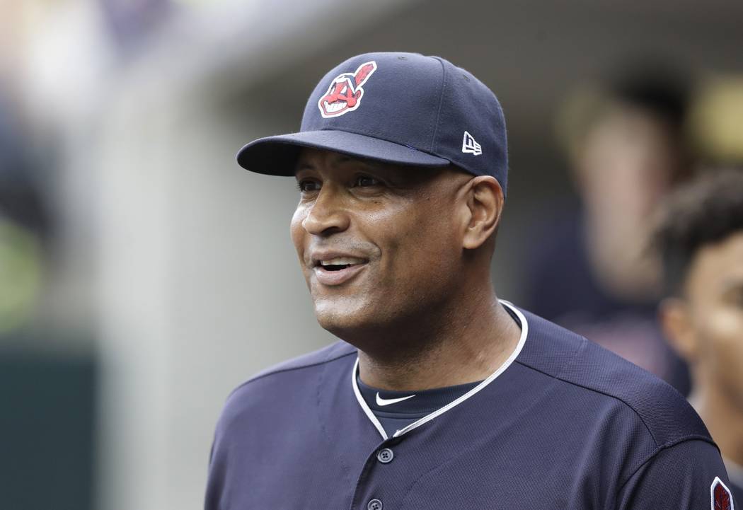 Cleveland Indians first base coach Sandy Alomar Jr. walks in the dugout during the first inning of a baseball game against the Detroit Tigers, Saturday, Sept. 2, 2017, in Detroit. (AP Photo/Carlos ...
