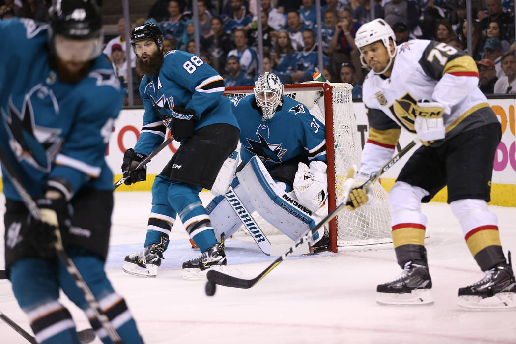 San Jose Sharks goaltender Martin Jones (31) and defenseman Brent Burns (88) defend against Vegas Golden Knights right wing Ryan Reaves (75) during the first period in Game 6 of an NHL hockey seco ...