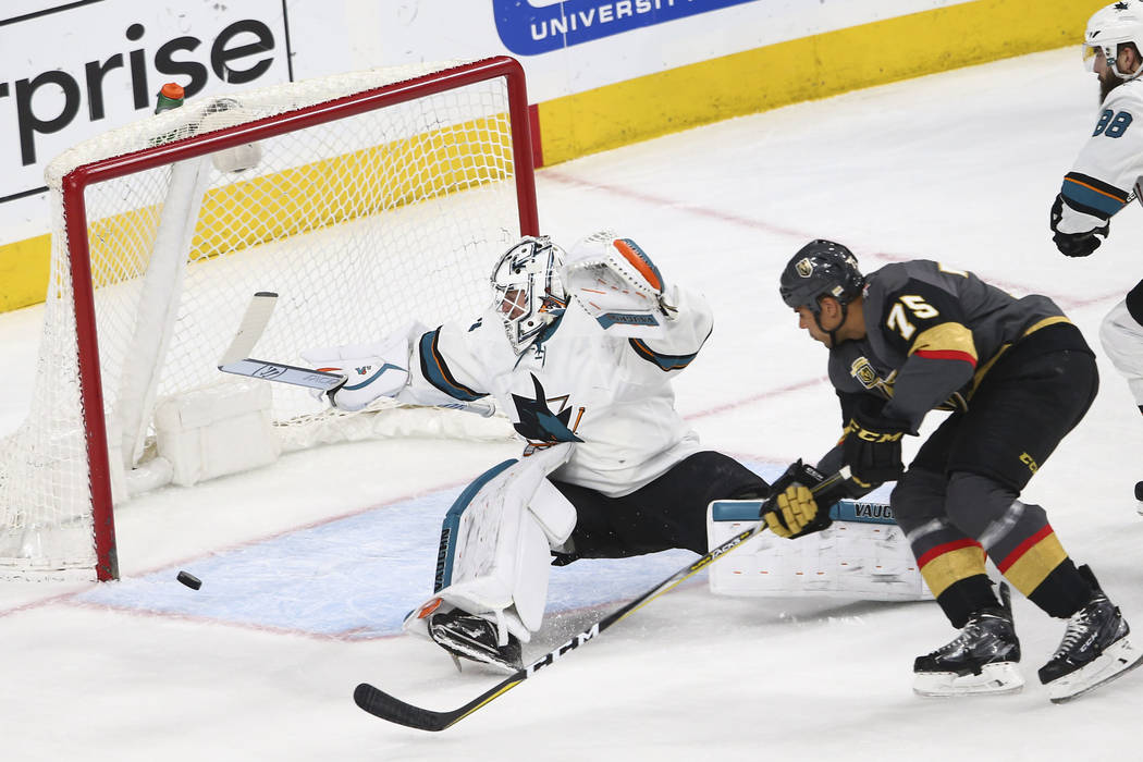 Golden Knights right wing Ryan Reaves (75) tries to score against San Jose Sharks goaltender Martin Jones (31) during the first period of an NHL hockey game at T-Mobile Arena in Las Vegas on Satur ...